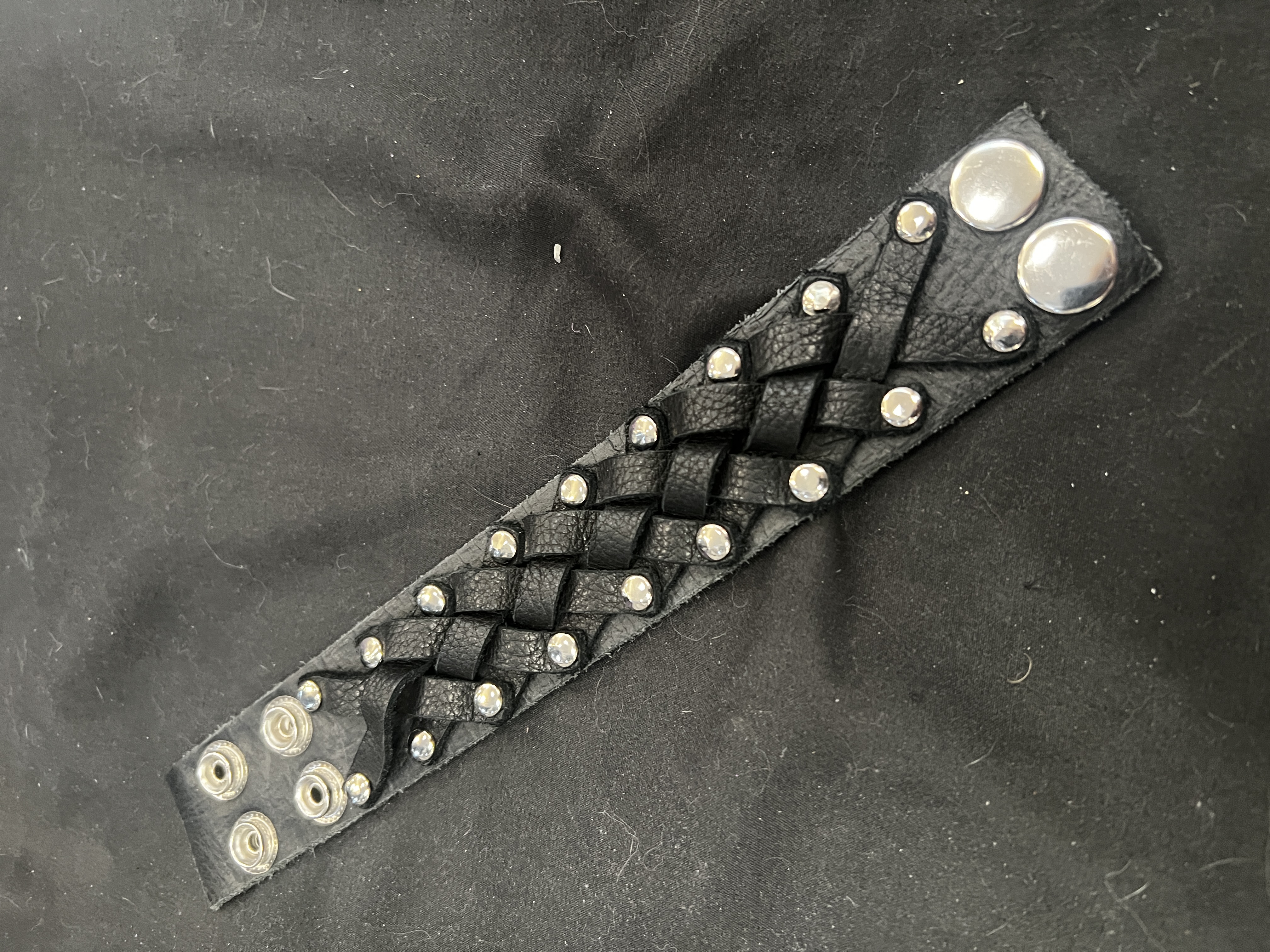 black weave cuff with silver rivets