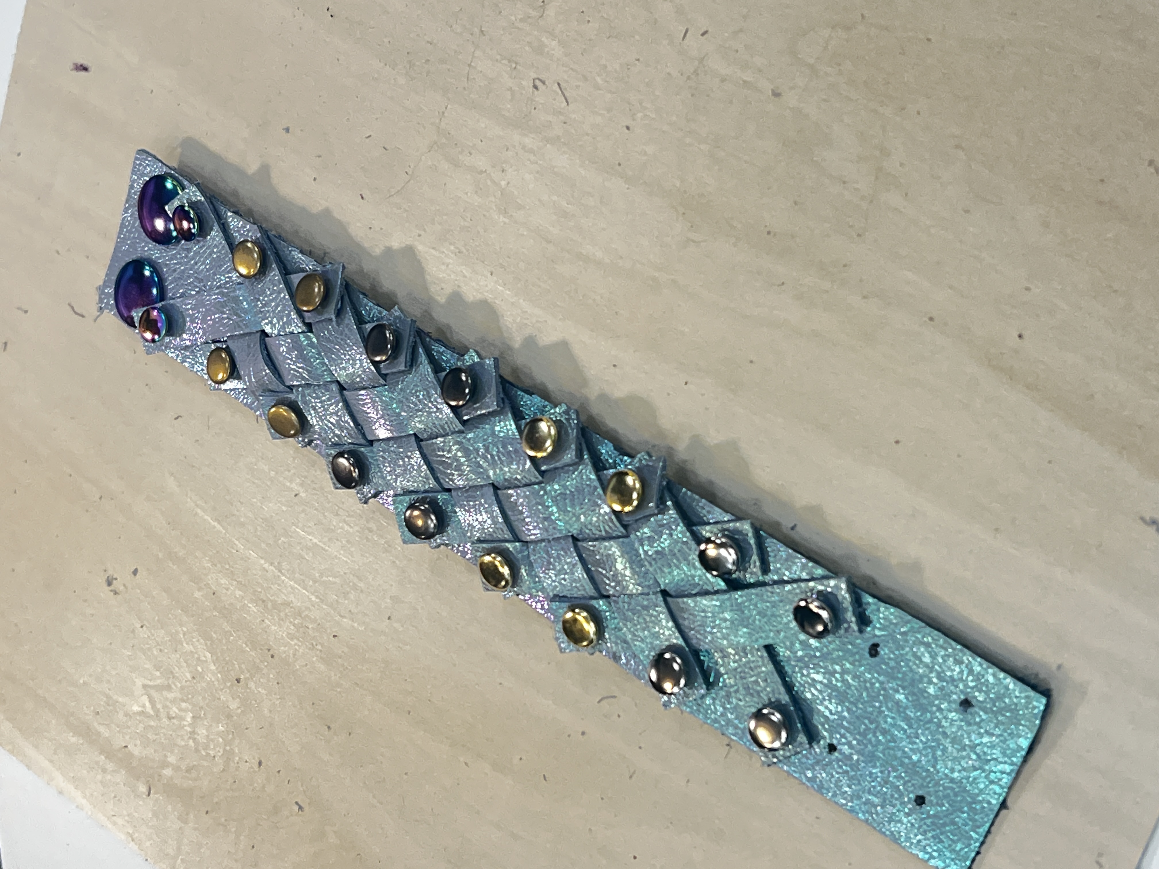iridescent seafoam weave with brass rivets
